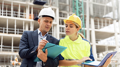 Stakeholders discussing at the construction site