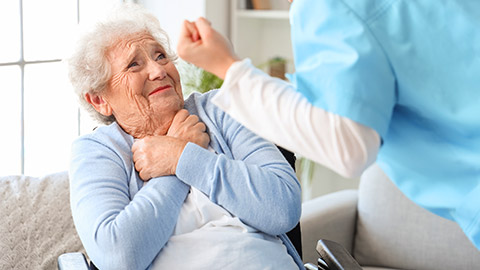 Senior woman scared of angry nurse at home