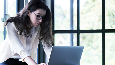 Woman using laptop