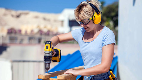 A person using power tools