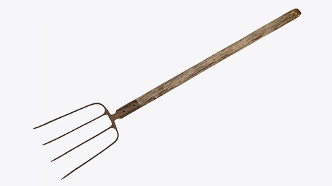 Old pitchfork on a white background. Working farm pitchfork isolated on white background.