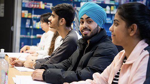 Several student sitting in a class