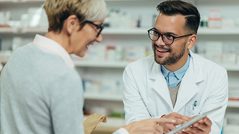 A pharmacist and client talking