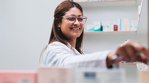 A smiling pharmacist