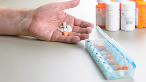 A person holding medication