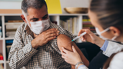 A patient getting a needle