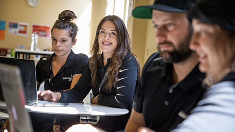 Staff members in a classroom