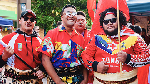 A group of young Pasifika men heading to a football game