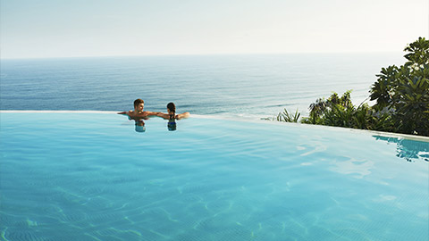 A couple in an infinity pool