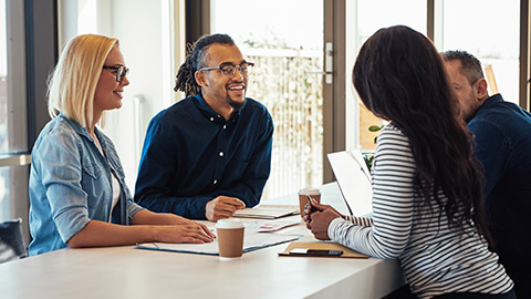 A group discussing a project in an office