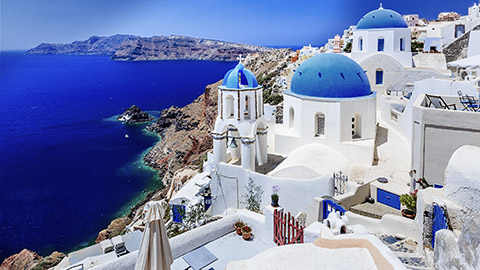 Santorini, Greece. Blue dome church of Oia (Ia) village.