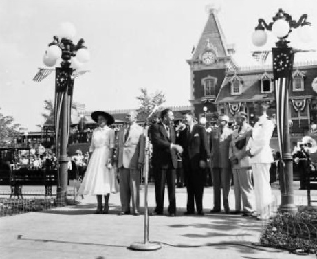 Walt Disney with two children