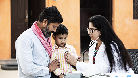 a child doctor servce checking on a child