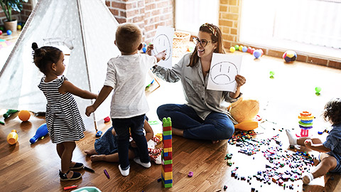 A person teaching kids on emotions