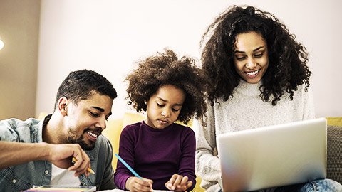 A child and parents doing daily homeworks