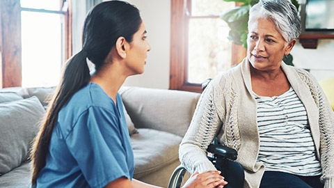 A carer talking to a client