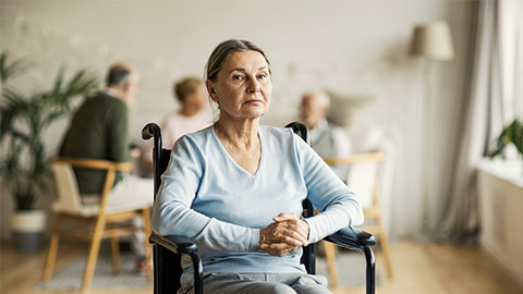 portrait of a senior woman on a wheelchair