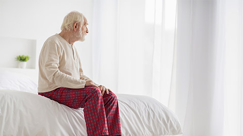 lonely old man sitting and in deep thinking