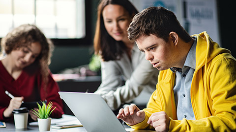 Down-syndrome man attending education class in community center