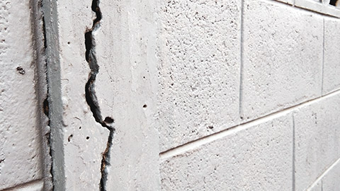 A close view of a damaged wall