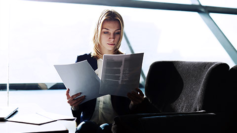 Business woman reading documents