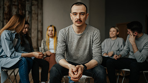 A group of drug users in a rehab setting