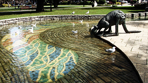 Kangaroo bronze craft art in Park with Aboriginal art