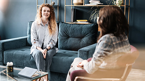 woman talking with therapist