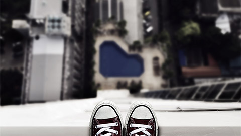 A person at the edge of a ledge