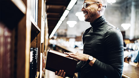 A lawyer reading a law book