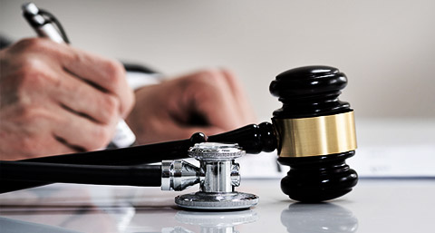 A medico-legal writing a document