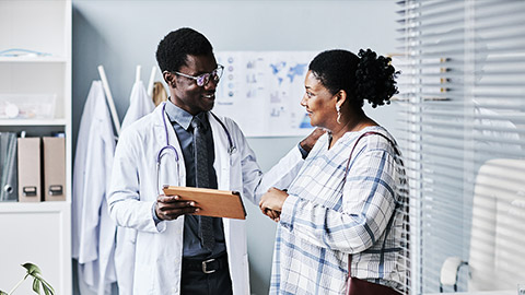 A doctor talking to a patient