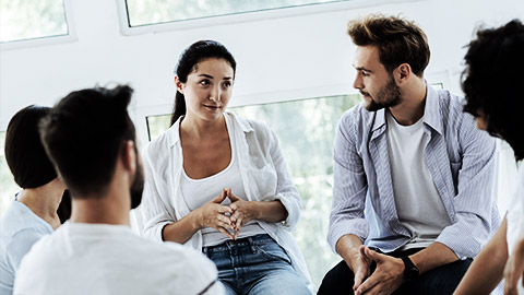 A group of medical carers talking to each other