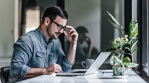 Working with computer on desk