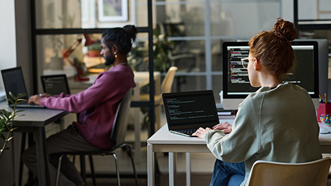 A modern office interior with people working