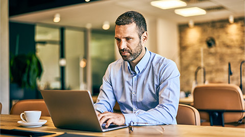 Concentrated businessman working on a project