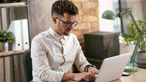 man using laptop