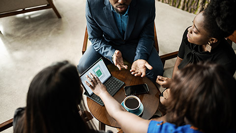 a group researching in a cafe