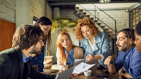 Young business partners having meeting in office