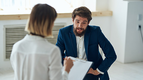 A counsellor talking to a client