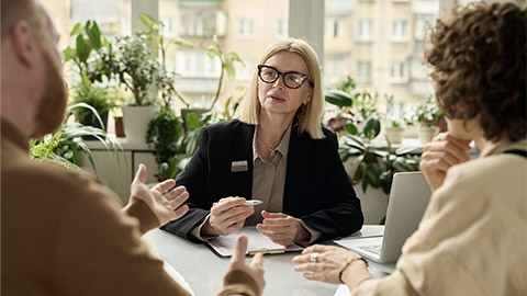 Portrait of mature woman consulting couple in insurance agency office

Portrait of mature woman consulting couple in insurance agency office