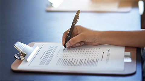 Clipboard, hands and writing on document with pen for survey