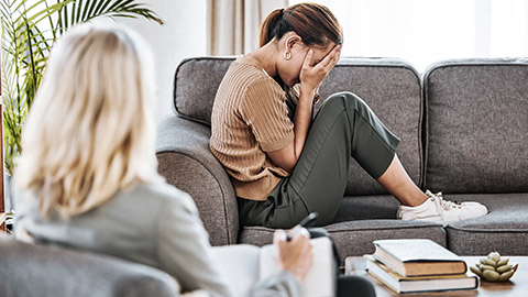 woman crying with therapist