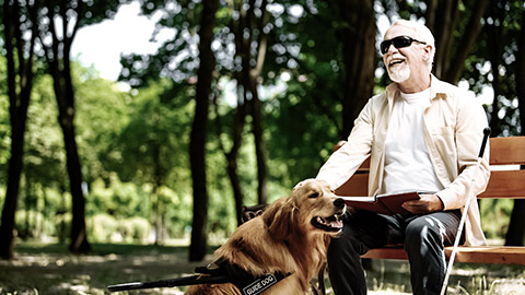 Blind man with dog