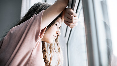 A girl looking out the window