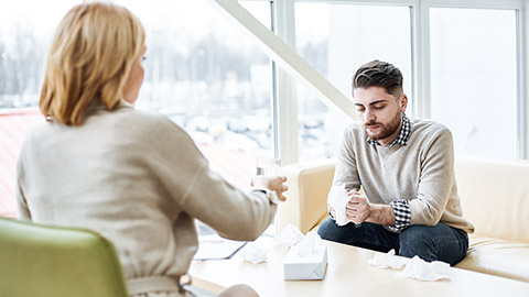 Man counselling with psychiatrist