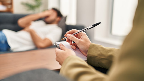 Man and woman having psychology session at psychology center