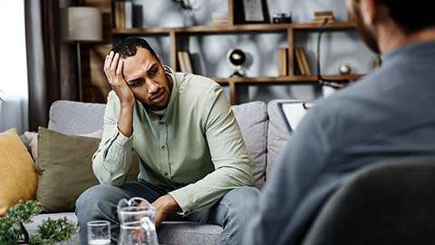 man talking with counsellor