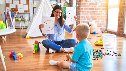 Young therapist woman speaking with child