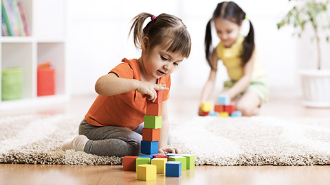 A child playing with building blocks